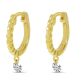 Lady's 14k Yellow Gold Dancing Diamond Huggie Earrings | 0.16ct