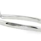 Lady's 14 Karat White Gold Ring featuring a Bezel-Set Pear-Shape Ruby and Diamond Accents