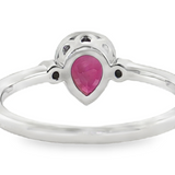 Lady's 14 Karat White Gold Ring featuring a Bezel-Set Pear-Shape Ruby and Diamond Accents