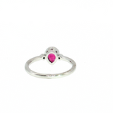 Lady's 14 Karat White Gold Ring featuring a Bezel-Set Pear-Shape Ruby and Diamond Accents