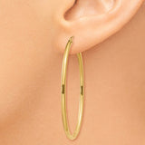 14k 2x47mm Oval Polished Tube Hoop Earrings TA259